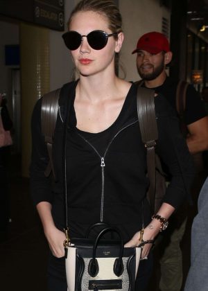 Kate Upton in Black at LAX airport in Los Angeles